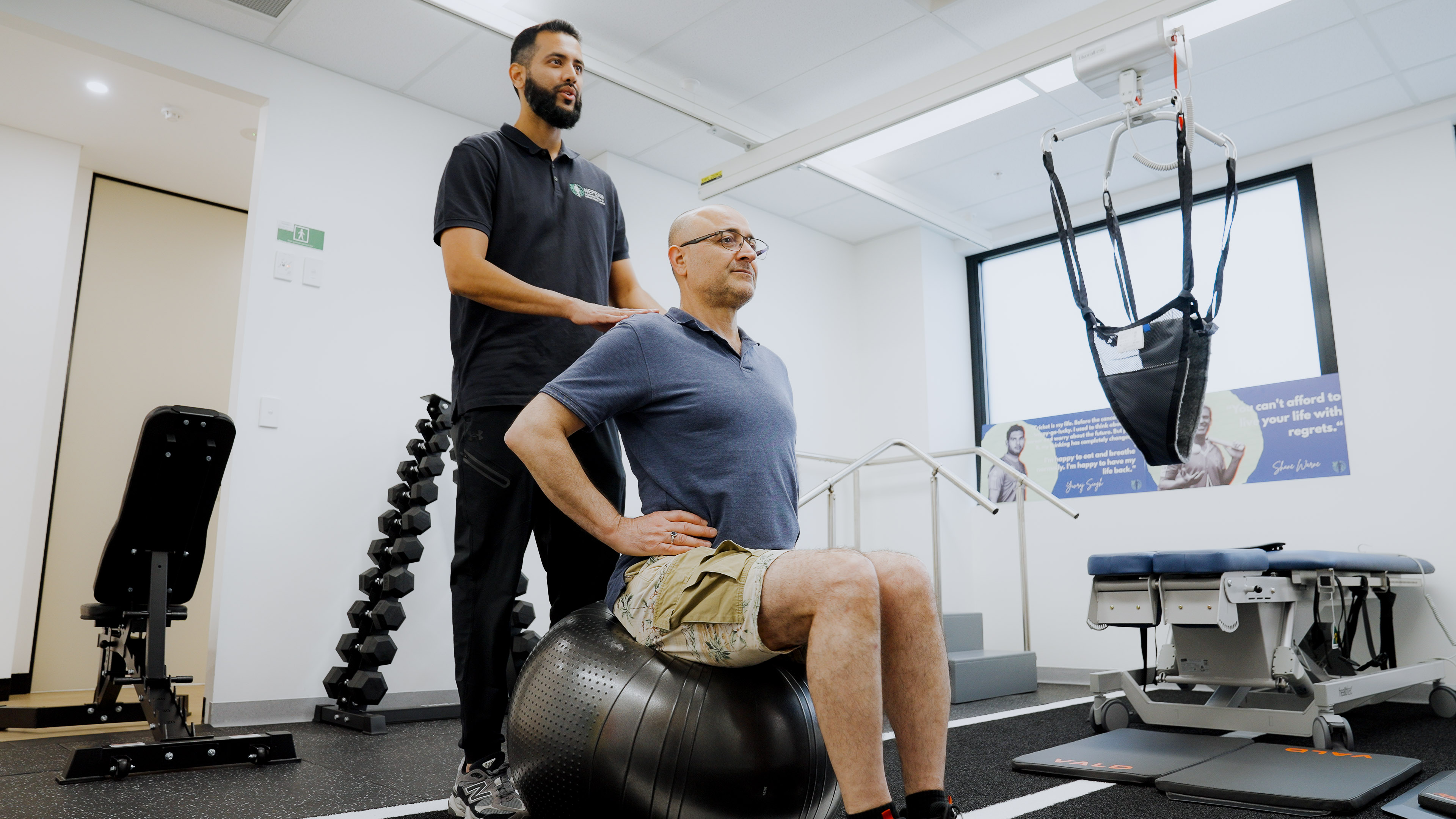 Stability ball core exercise with physiotherapist at Nepean Advanced Rehab