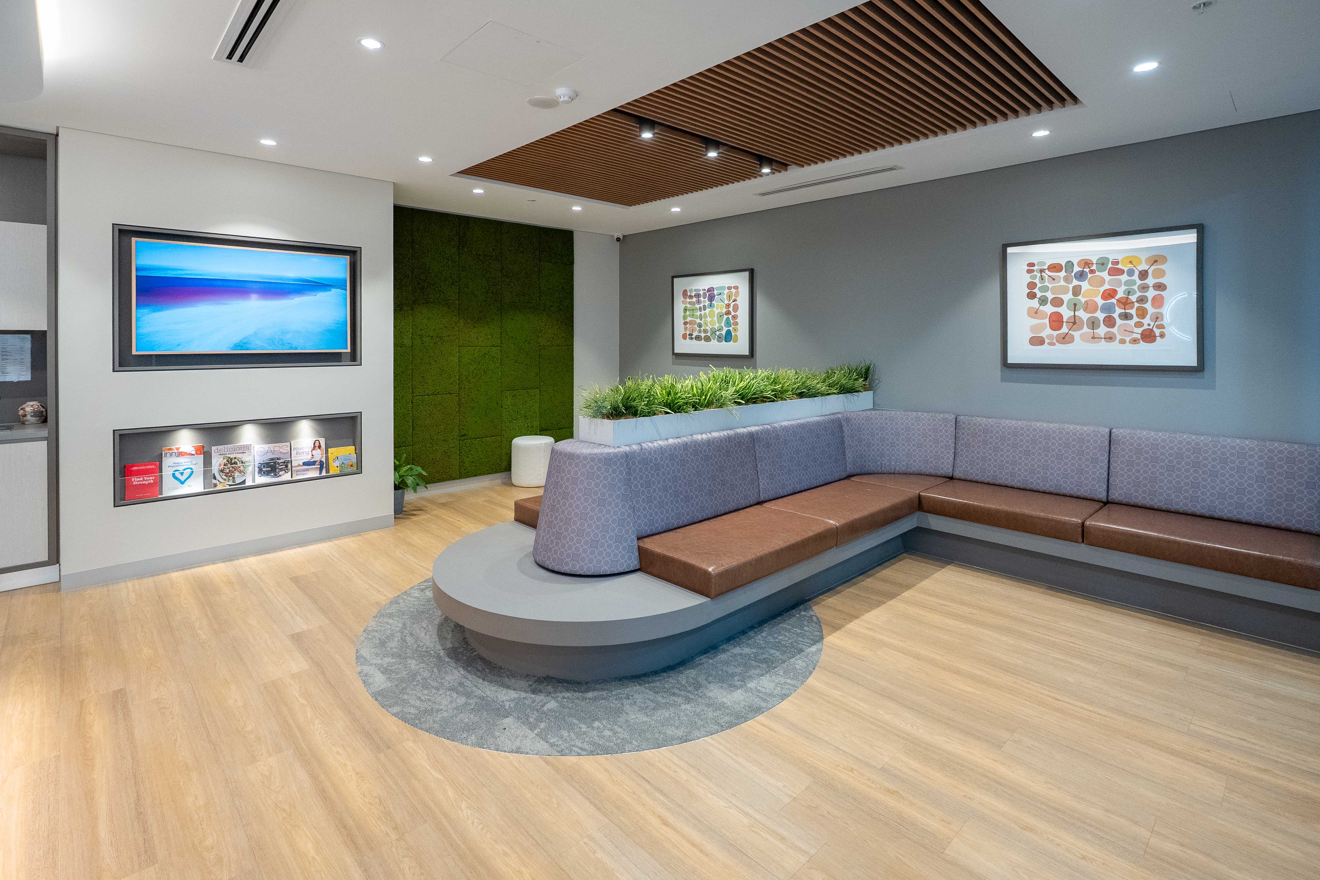 Modern waiting lounge with moss wall at Nepean Advanced Rehab
